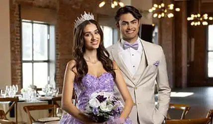 A group of teens with vibrant tuxedos and dresses in prom
